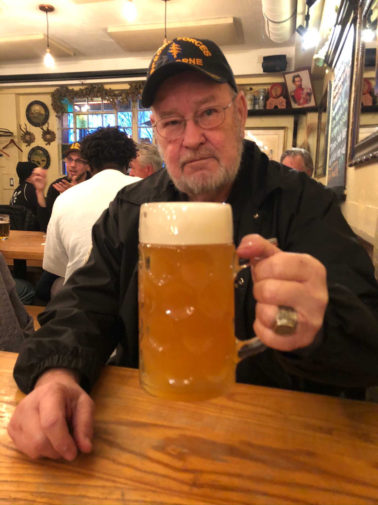Mike saluting with beer